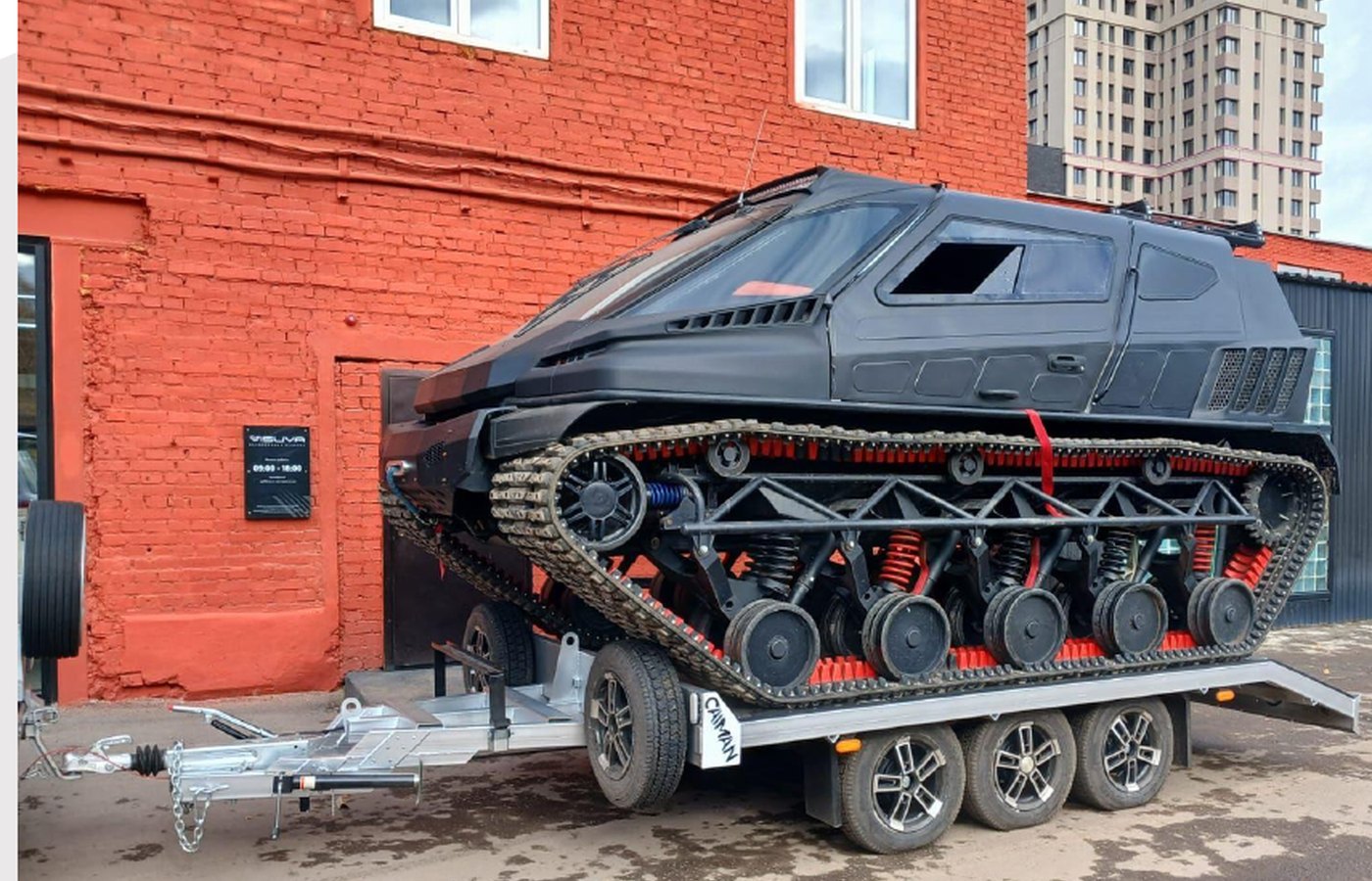 Special-purpose trailer carrying tracked equipment